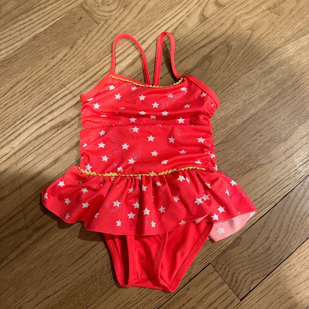 Girls sparkling bright pink bathing suits